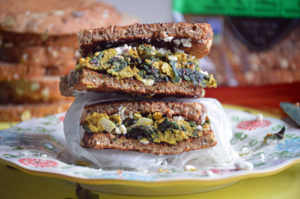 Turmeric Egg Sandwich with Swiss Chard & Feta on Dave's Killer Bread