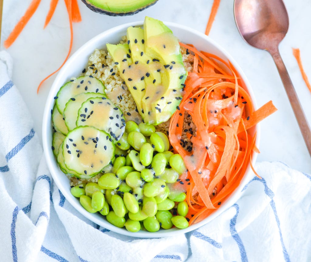 Vegan Sushi Bowl Recipe with carrots, cucumber, edamame, avocado, seaweed, sesame seeds & Miso Dressing